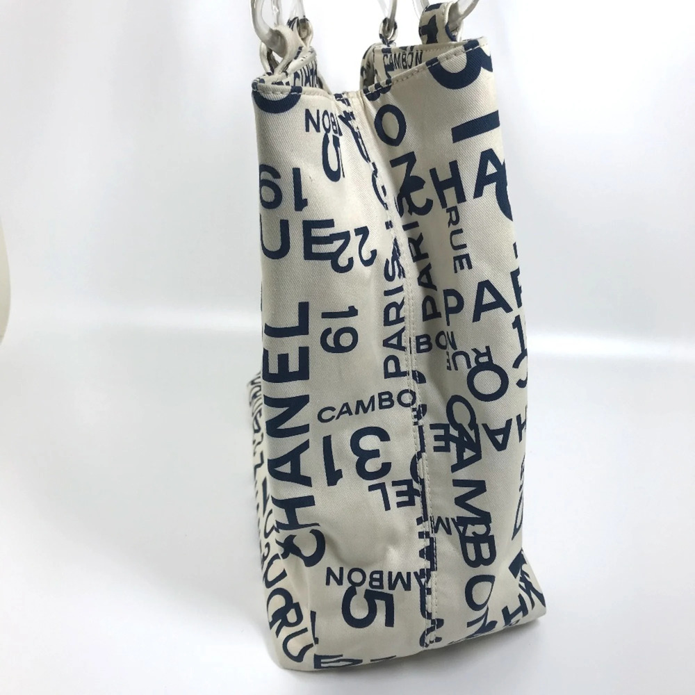 CHANEL White Canvas Logo Shoulder Bag - Picture 2 of 15